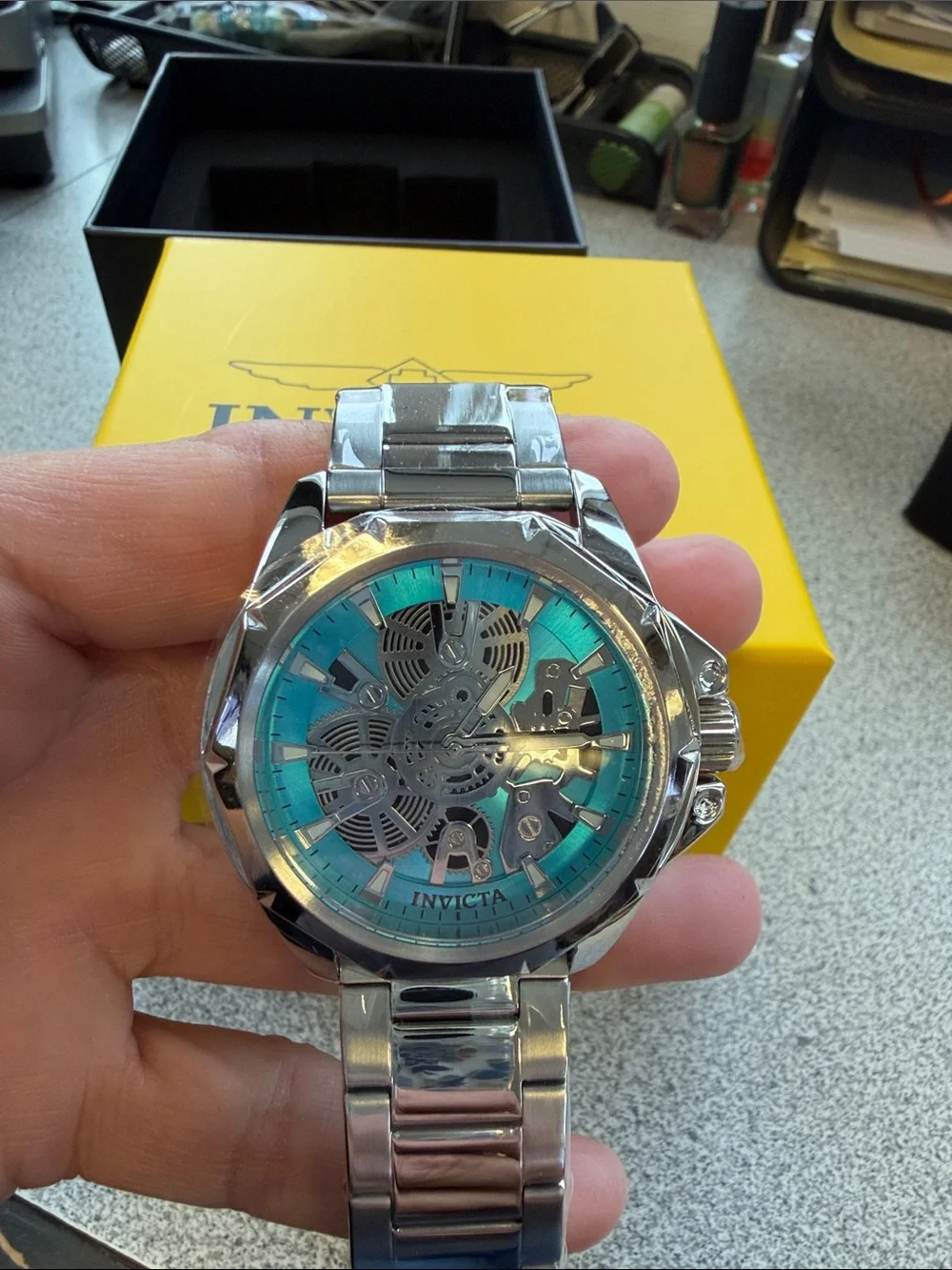 Invicta Silver Watch with Turquoise Dial and Skeleton Movement
